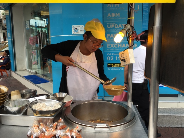street vendor making fish maw soup
